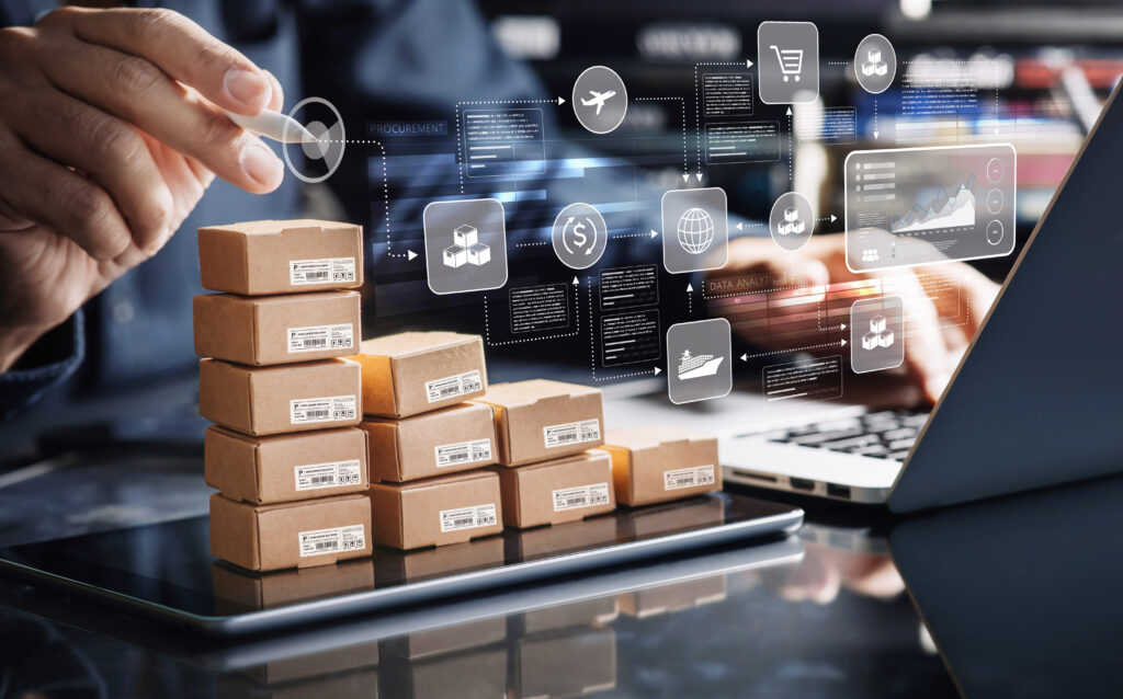 Small parcels stacked beside a laptop with e-commerce icons, representing an online store