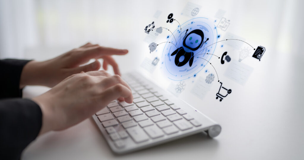Hands typing on a keyboard with online shopping icons floating above it